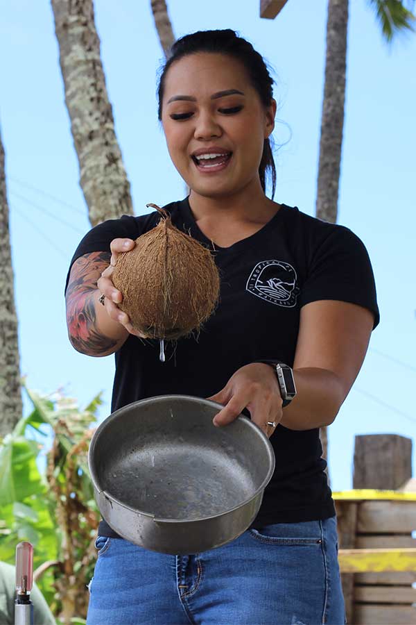 drain out the coconut water before opening a coconut step by step