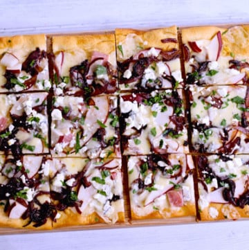 Pear and goat cheese flatbread with caramelized onions and ham