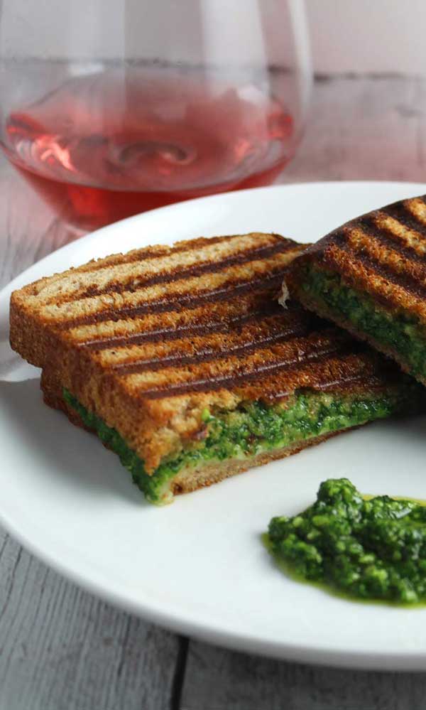 Gourmet grilled cheese with pesto ideas featuring Kale Pesto Grilled Cheese with a side of basil pesto