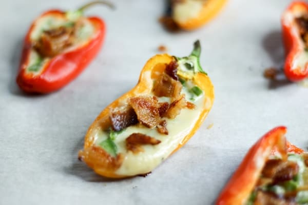 Orange stuffed bacon and goat cheese mini pepper baked in the oven