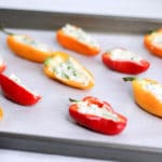 party tray of bacon and goat cheese stuffed mini peppers