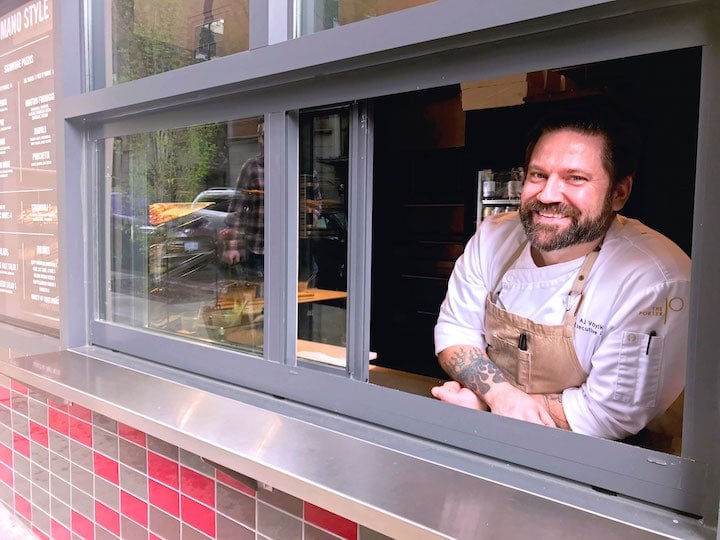 Chef AJ outside the Porter Hotel in Portland at Chiosco's pizza window