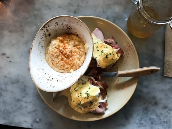 Eggs Benedict with grits at Besaws in Portland for brunch