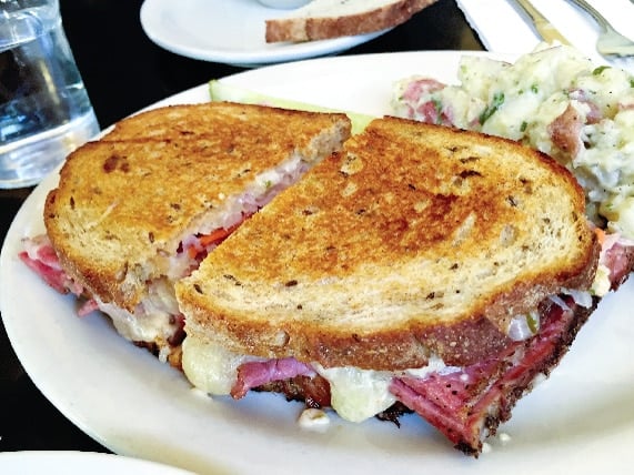 Lunch in Portland restaurant Kenny and Zukes with a pastrami sandwich