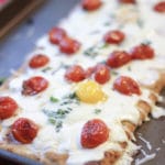 breakfast pizza with eggs baked in the oven