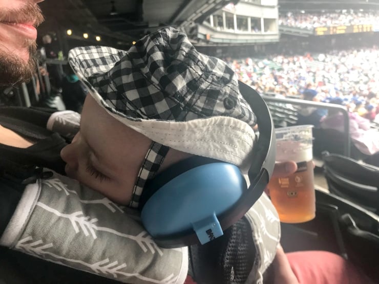 baby at baseball game