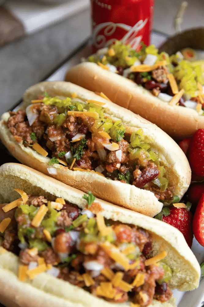 https://sipbitego.com/wp-content/uploads/2019/07/Gourmet-Hot-Dogs-with-Fun-Toppings-for-a-hot-dog-bar-Pressure-Cooker-Coca-Cola-Chili-and-Sausage-Dog-the-forked-spoon.png