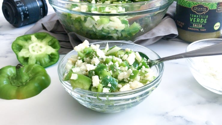 green pepper salad in a bowl with cojita cheese