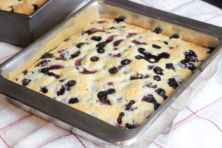 berry cake bars in a pan done cooking