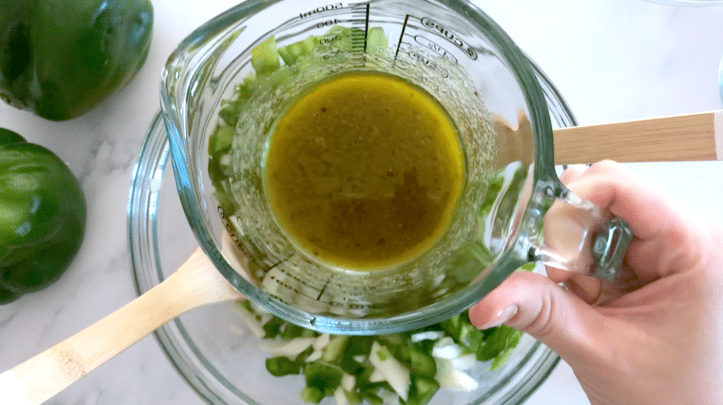 salsa verde dressing in a measuring cup