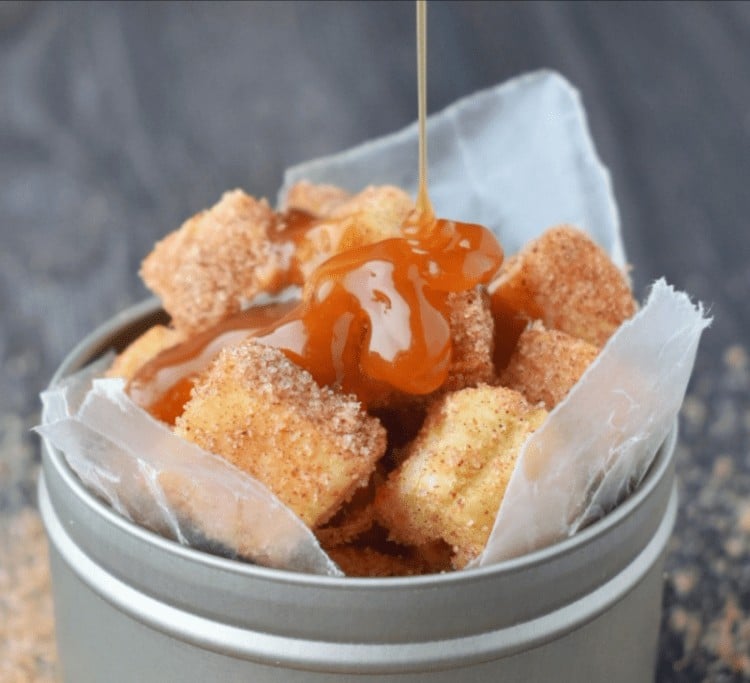 puff pastry idea for a party with a Churro dessert drizzled in caramel