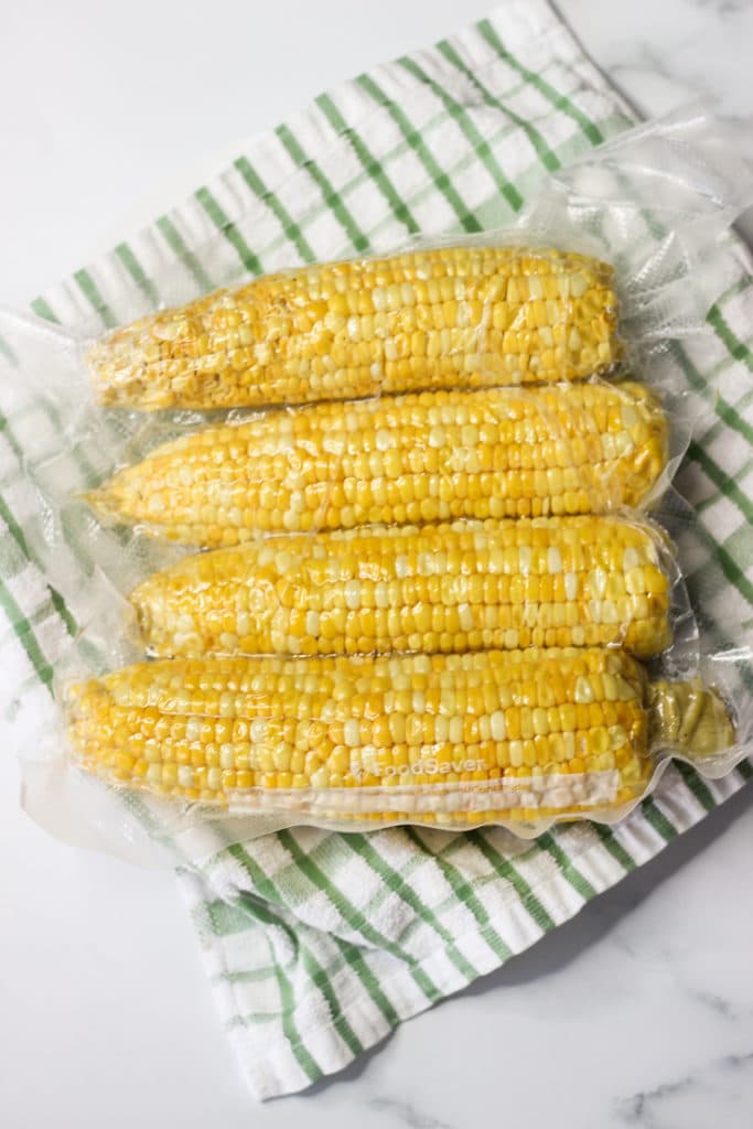  sous vide corn on the cob on a kitchen counter