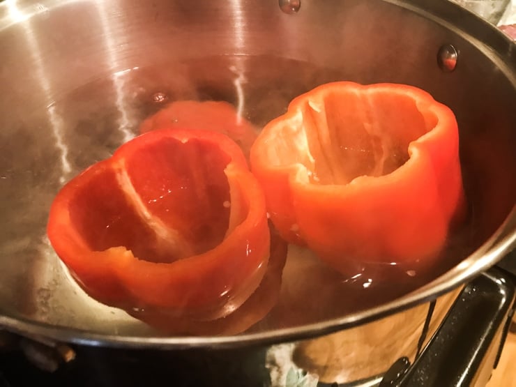 boiling peppers on the stove