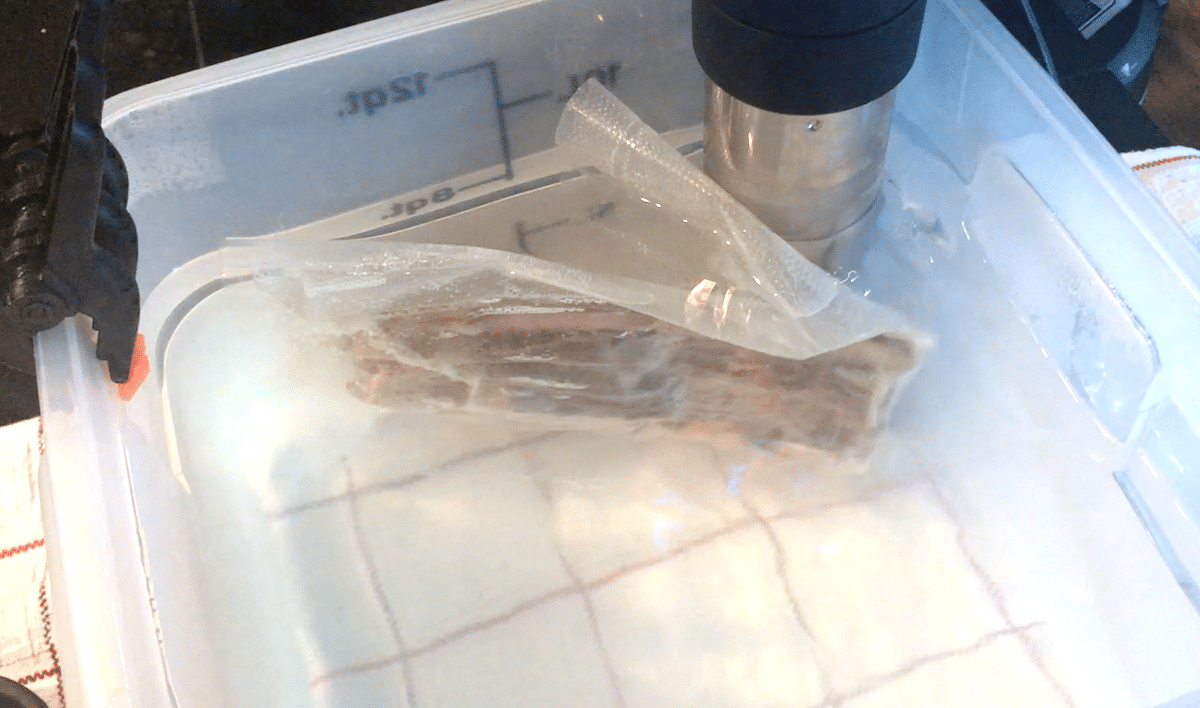 sous vide bacon with anova precision cooker in a sous vide bath