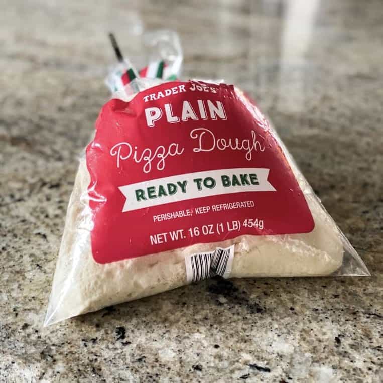 Trader Joe's Pizza Dough Fresh Crust In A Bag On A counter