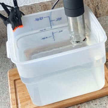 container filled with water aka a sous vide water bath