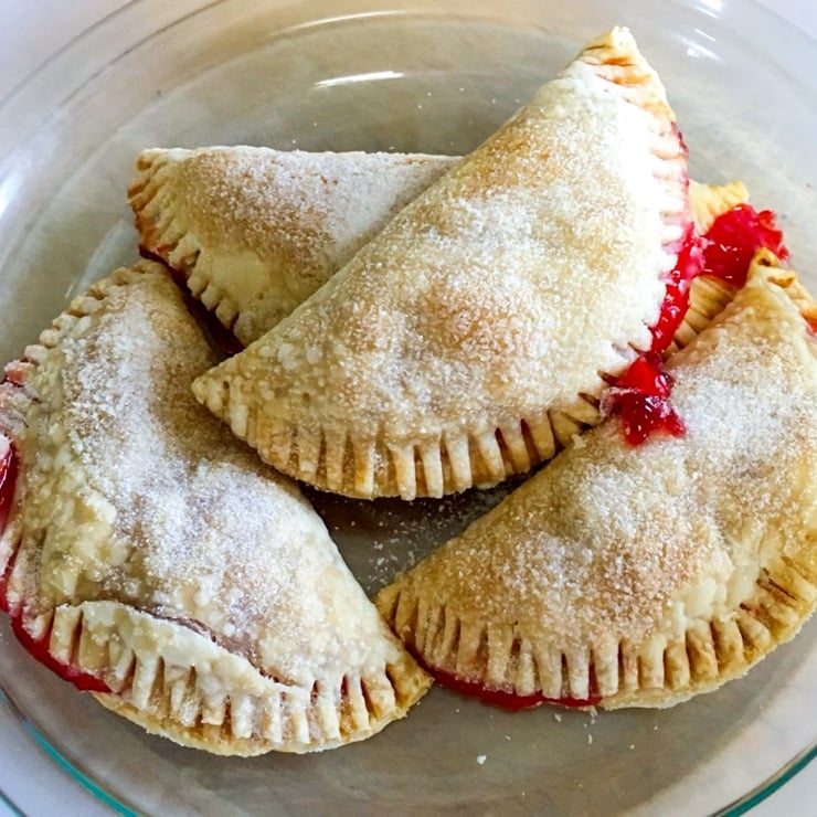 cherry pie turnovers on plate