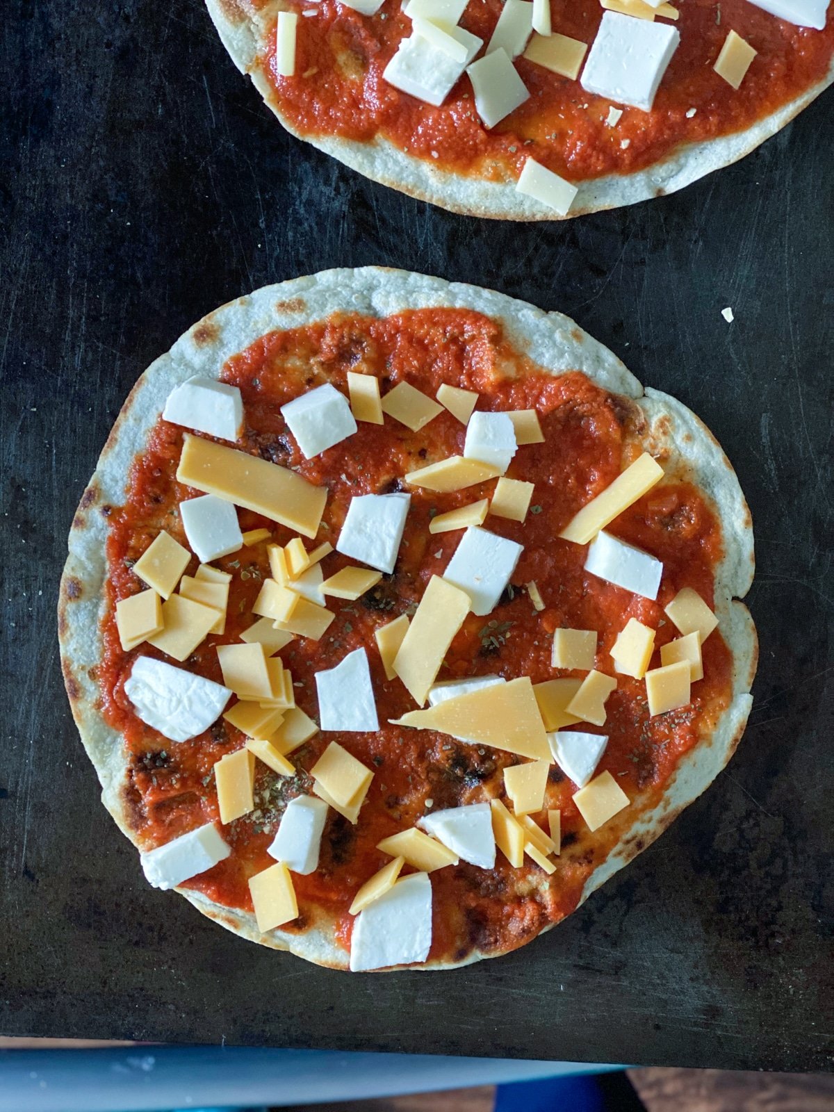 tortilla pizza with cheddar cheese from a costco shopping trip haul