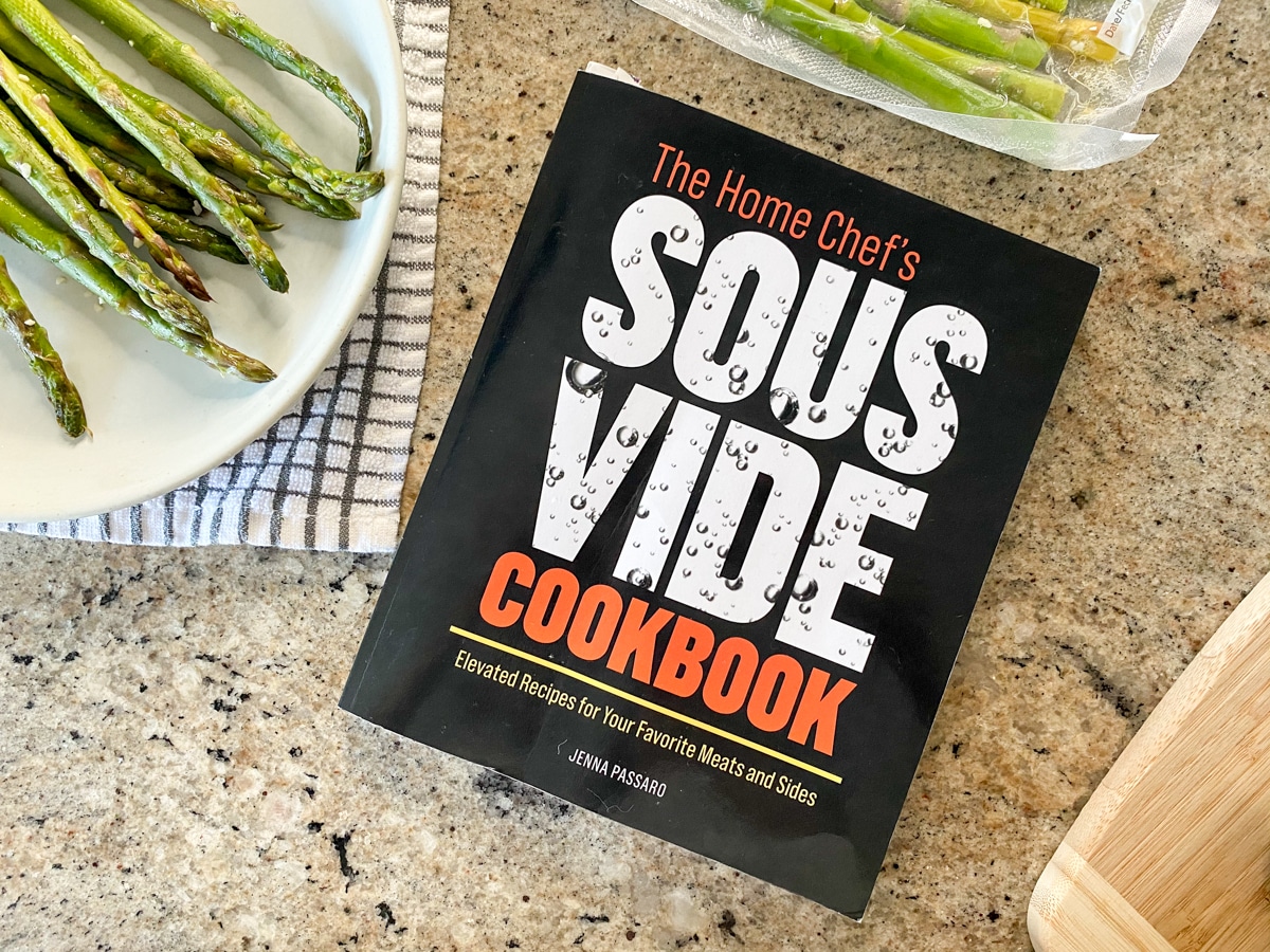 the home chef's sous vide cookbook by Jenna Passaro with sous vide asparagus