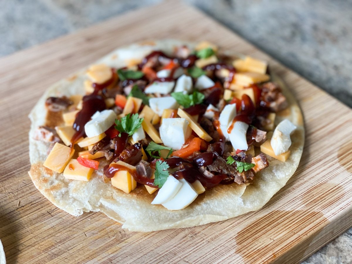 making a quesadilla with bbq pork leftovers