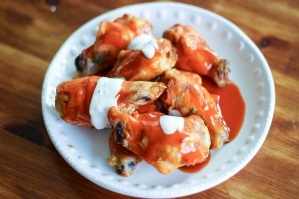 serving wings on a party plate