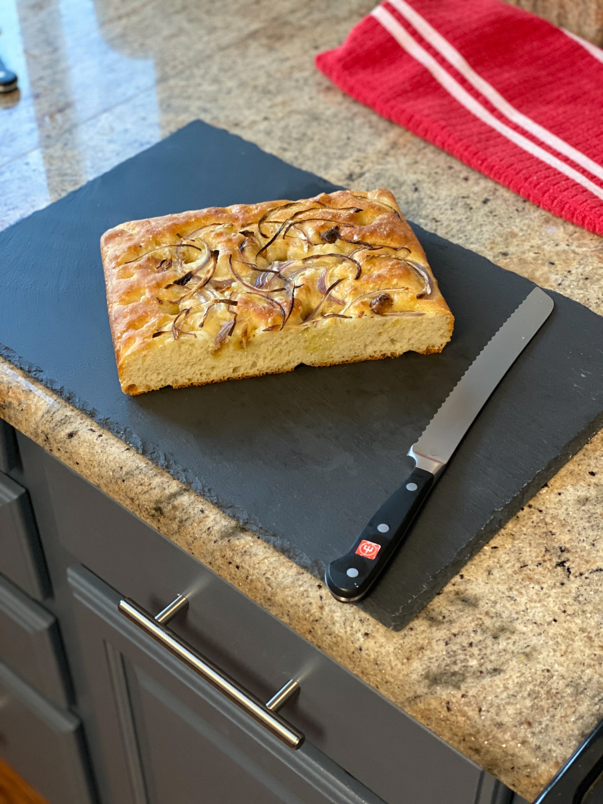 Focaccia topped with red onion