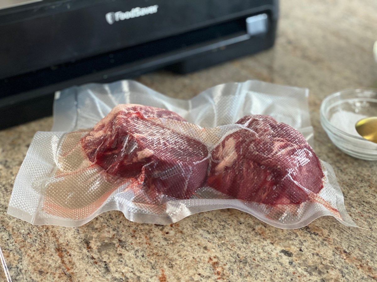 vacuum sealed filet mignon in Foodsaver bag