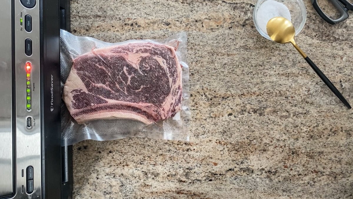 https://sipbitego.com/wp-content/uploads/2020/07/How-To-Vacuum-Seal-Ribeye-For-Sous-Vide-Cooking-Sip-Bite-Go-Step-by-step-3.jpg