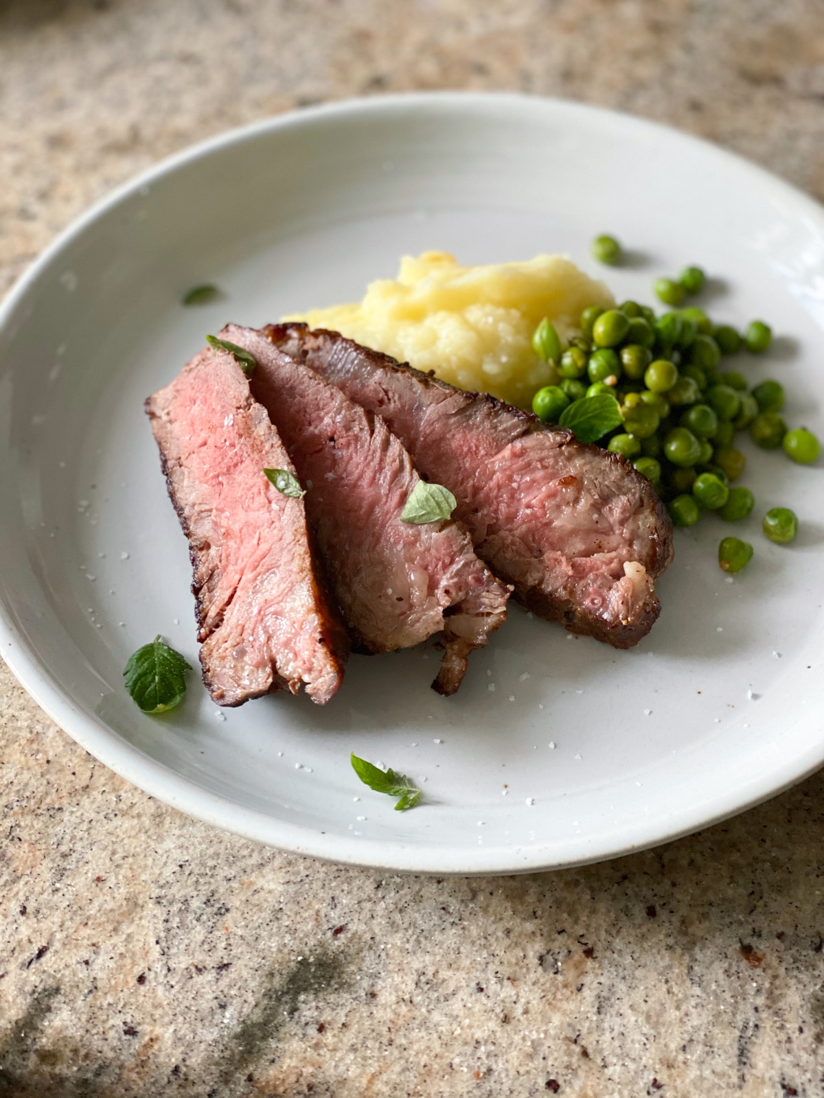 Sous vide New York strip steak cooked to medium-rare