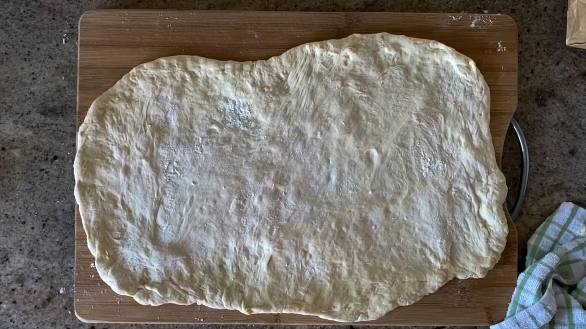 stretching whole foods dough for pizza