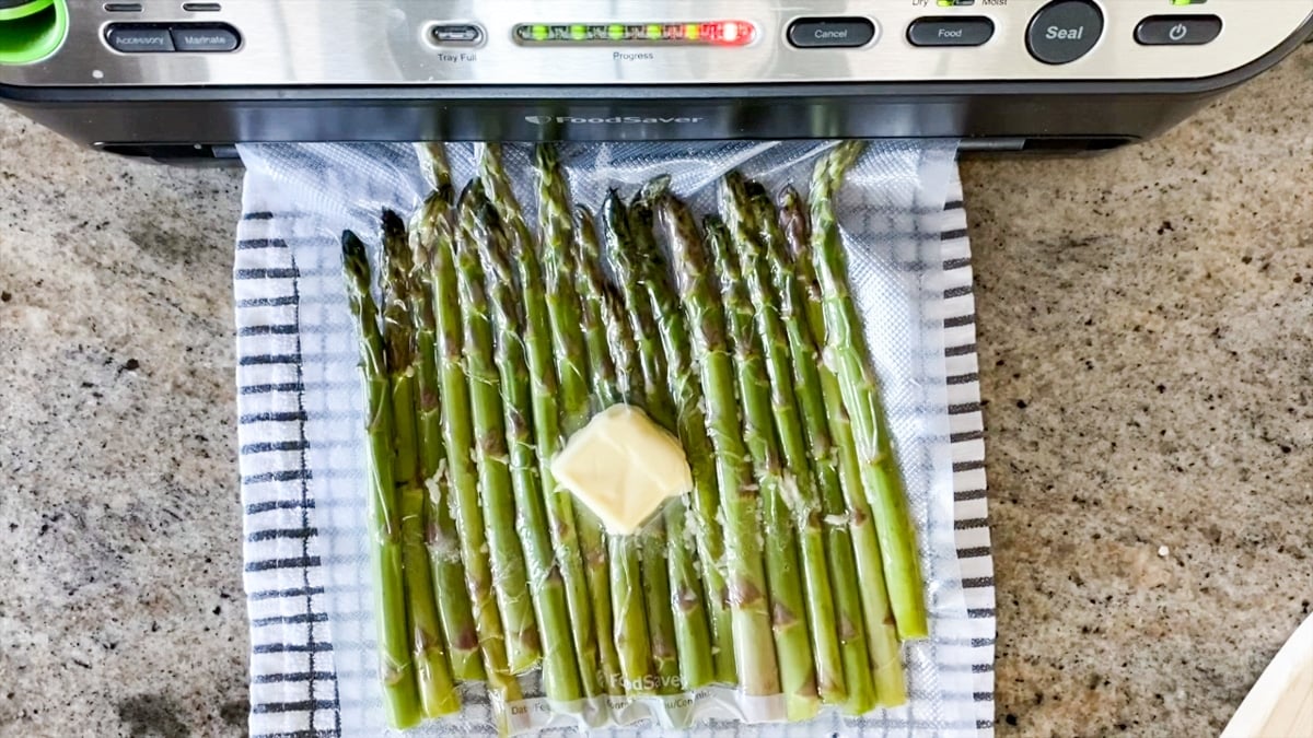 vacuum sealing asparagus with butter