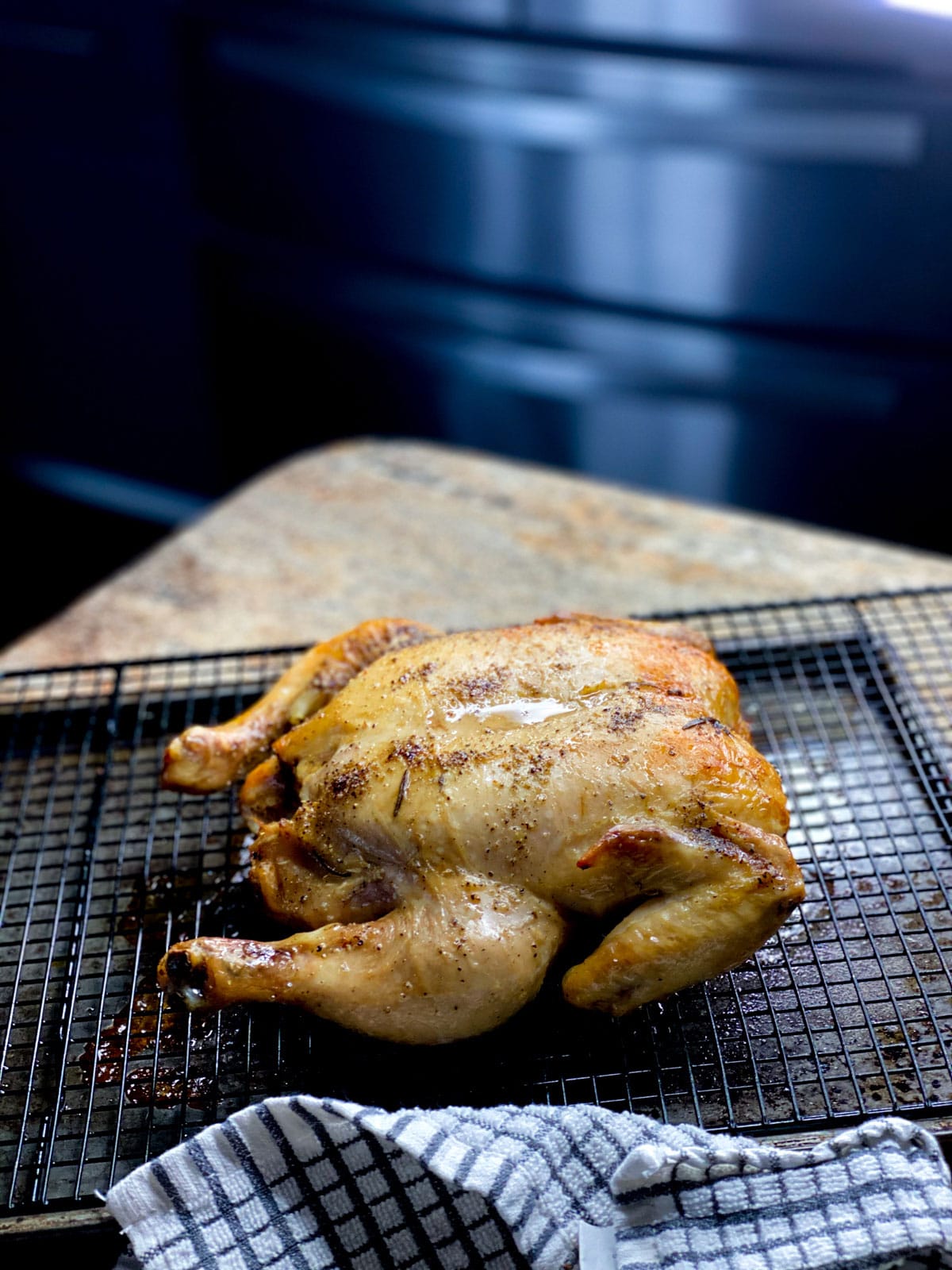 whole chicken sous vide cooked on a baking sheet