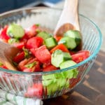 making a recipe with tomatoes and cucumbers feature