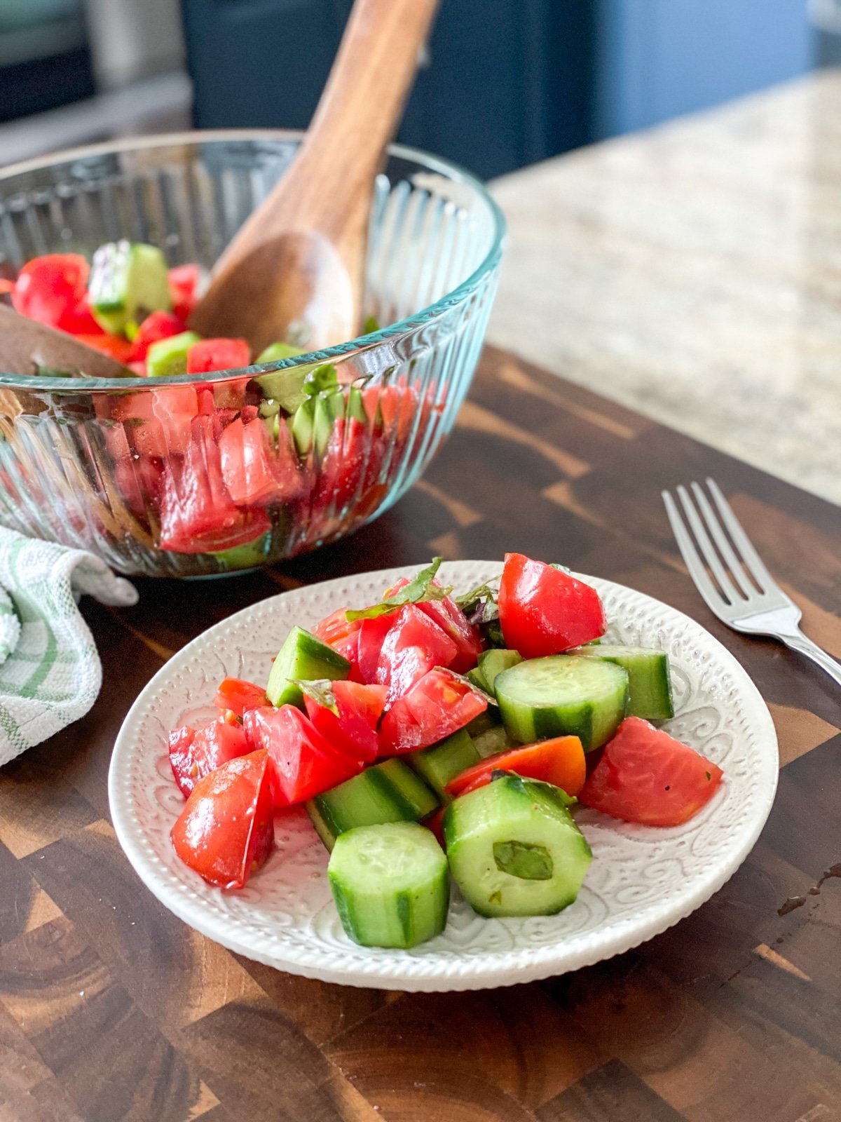 serving salad with tomatoes and cucumbers