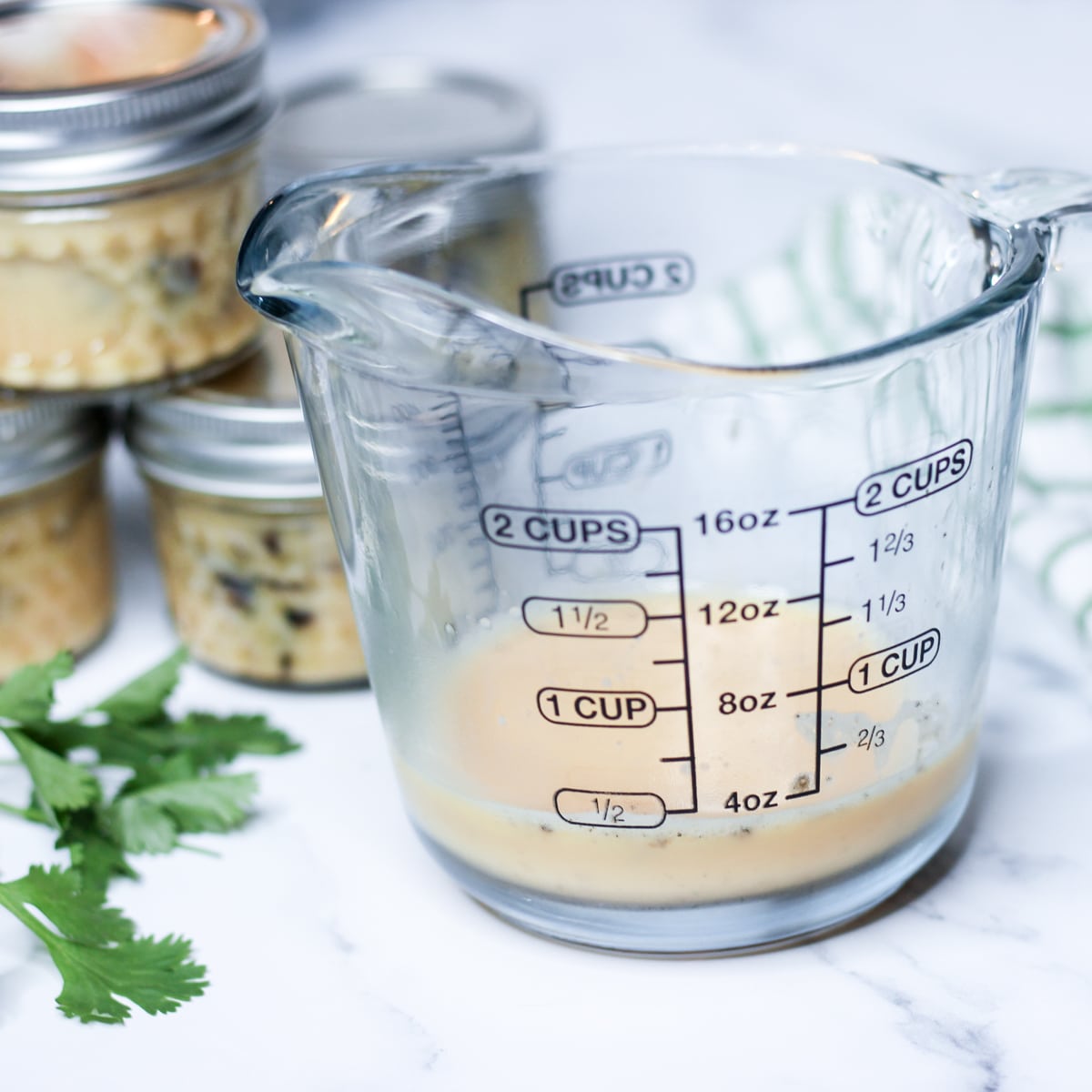 whisked egg for sous vide egg bites in measuring cup