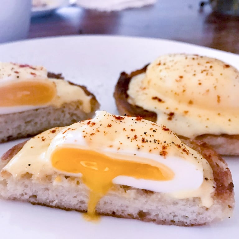 sous vide poached eggs benedict with oozing yolks