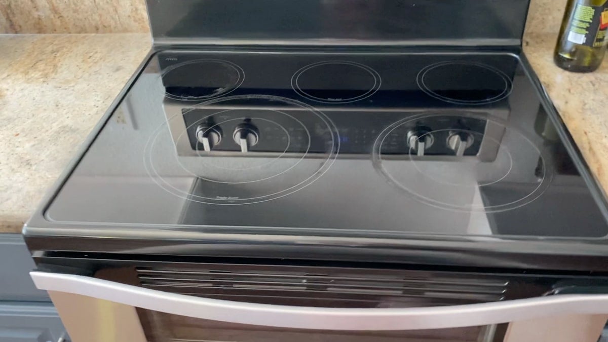 Clean flat black glass stove top after using product.