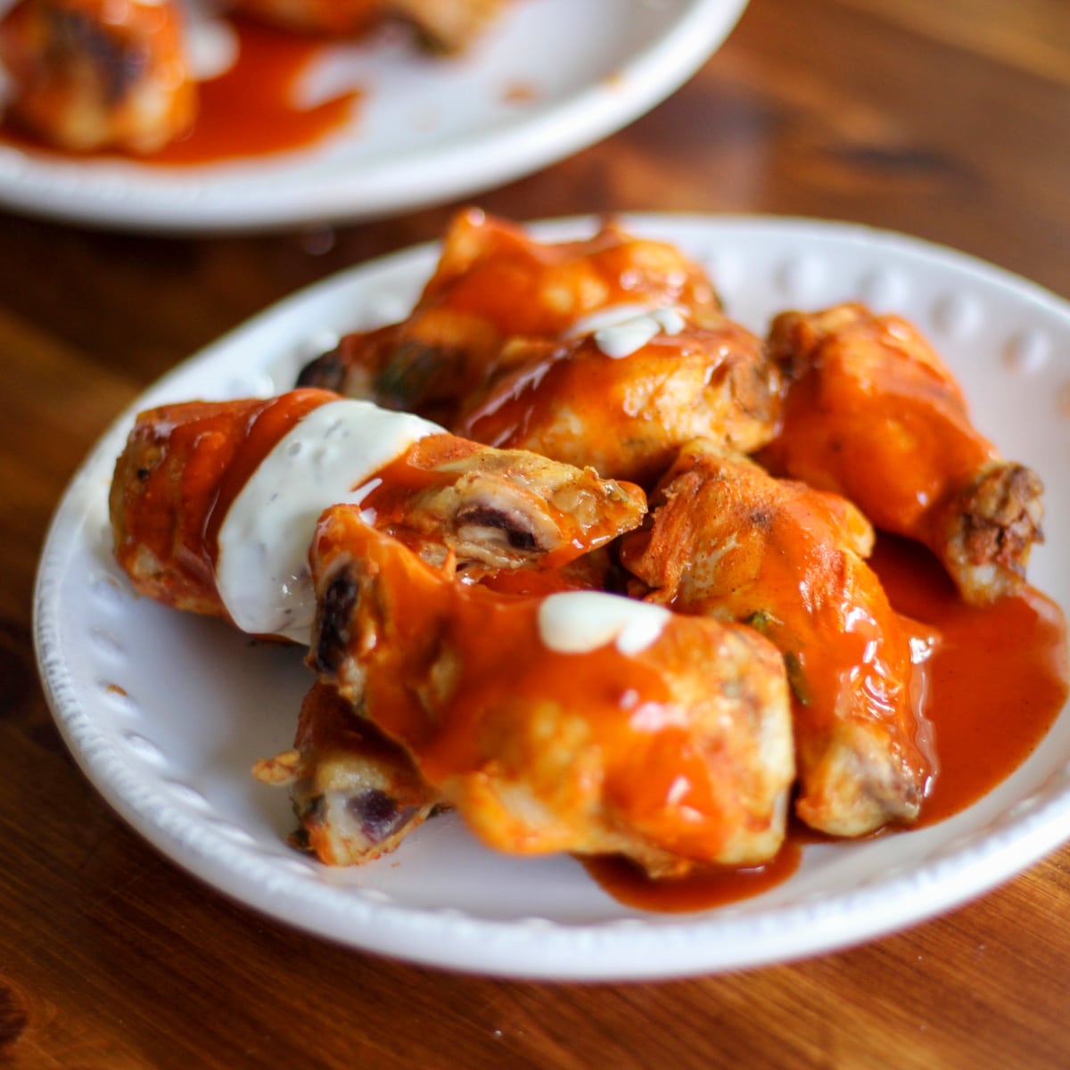 perfectly tender sous vide chicken wings with buffalo sauce