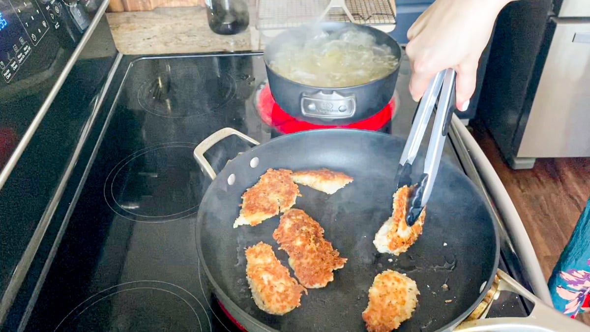 making Italian crispy chicken for pasta dish