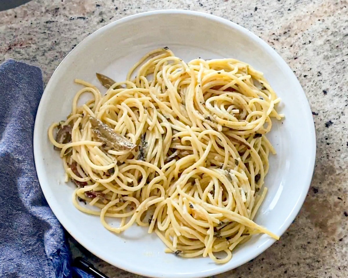 plate with spaghetti and jarred alfredo sauce