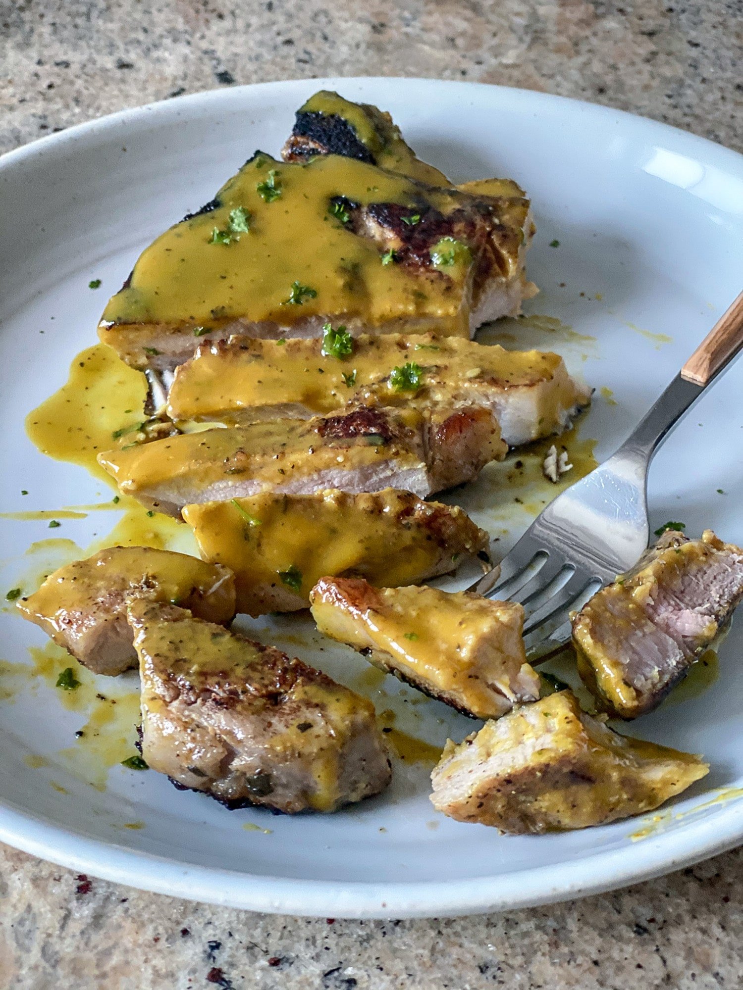 cutting sous vide pork chops with bbq sauce