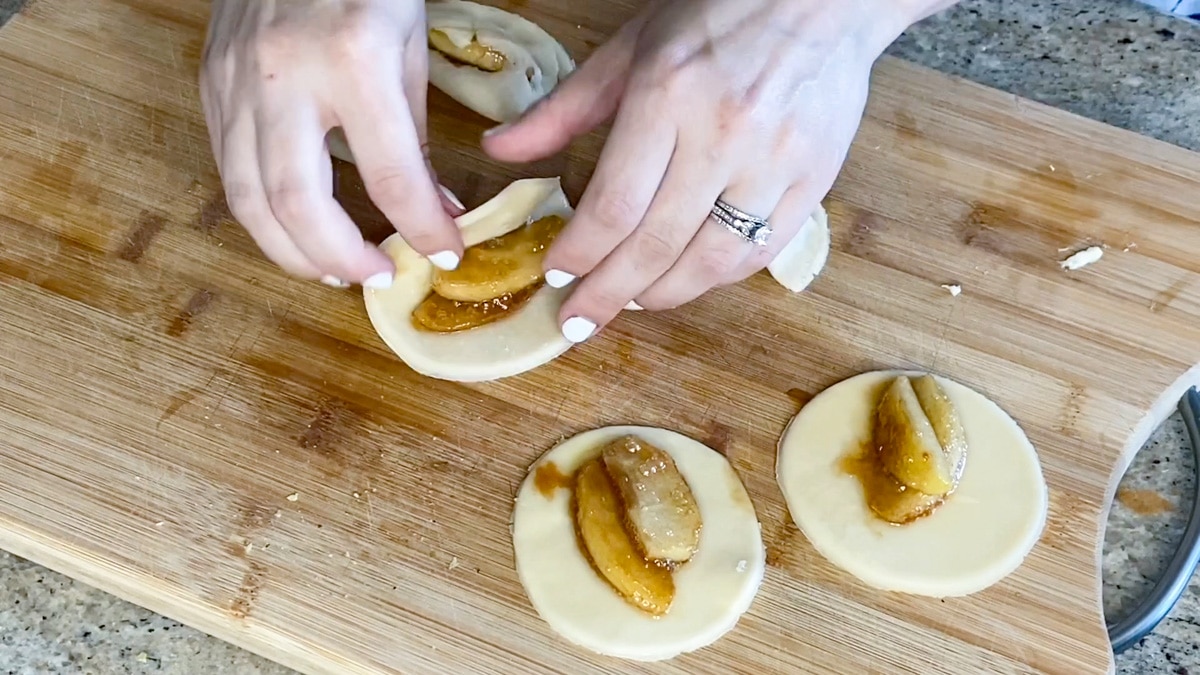 assembling mini hand pies with apples