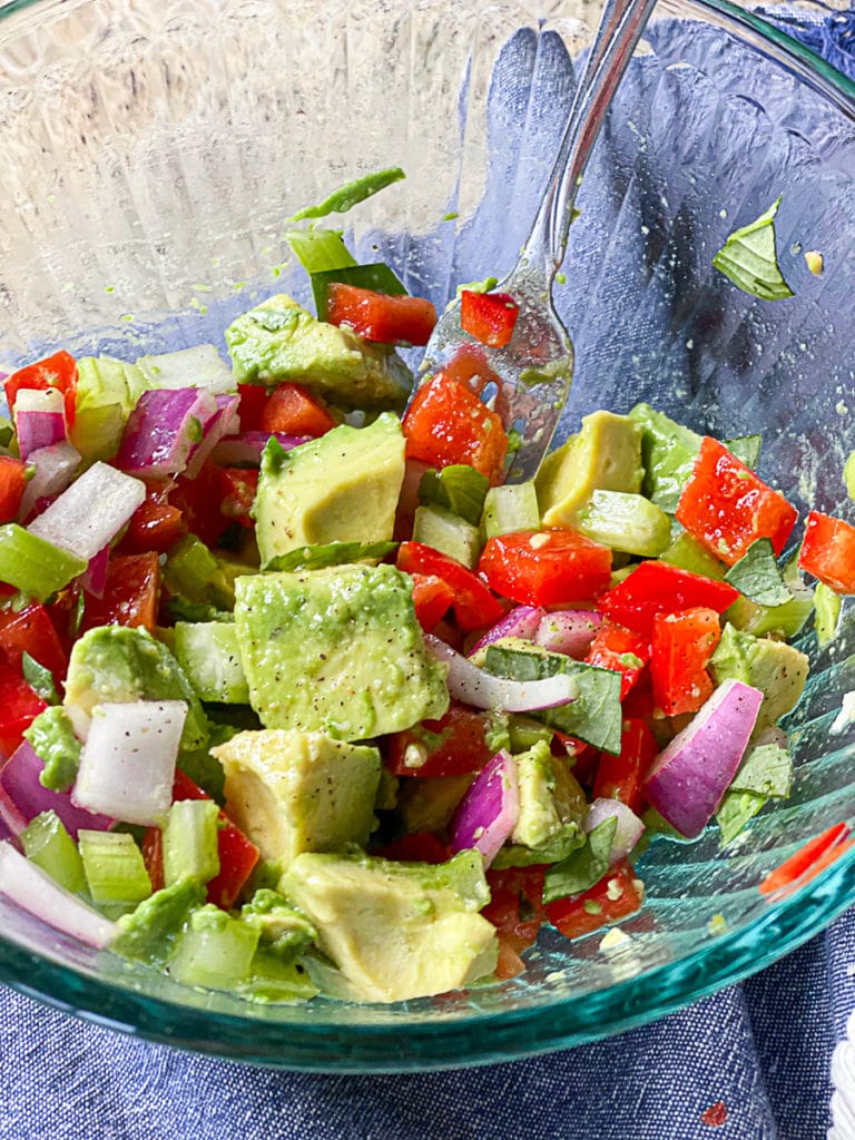 Thai basil on avocado salad