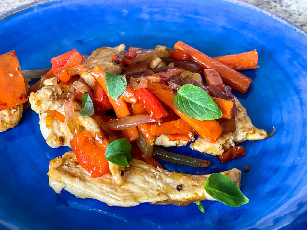 fresh herbs in stir fry with chicken and vegetables