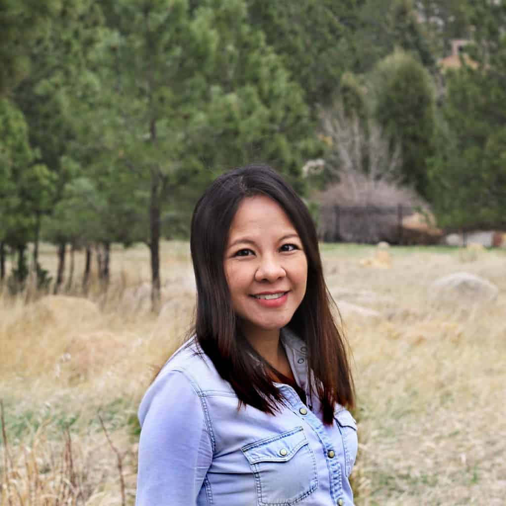 woman smiling while outdoors