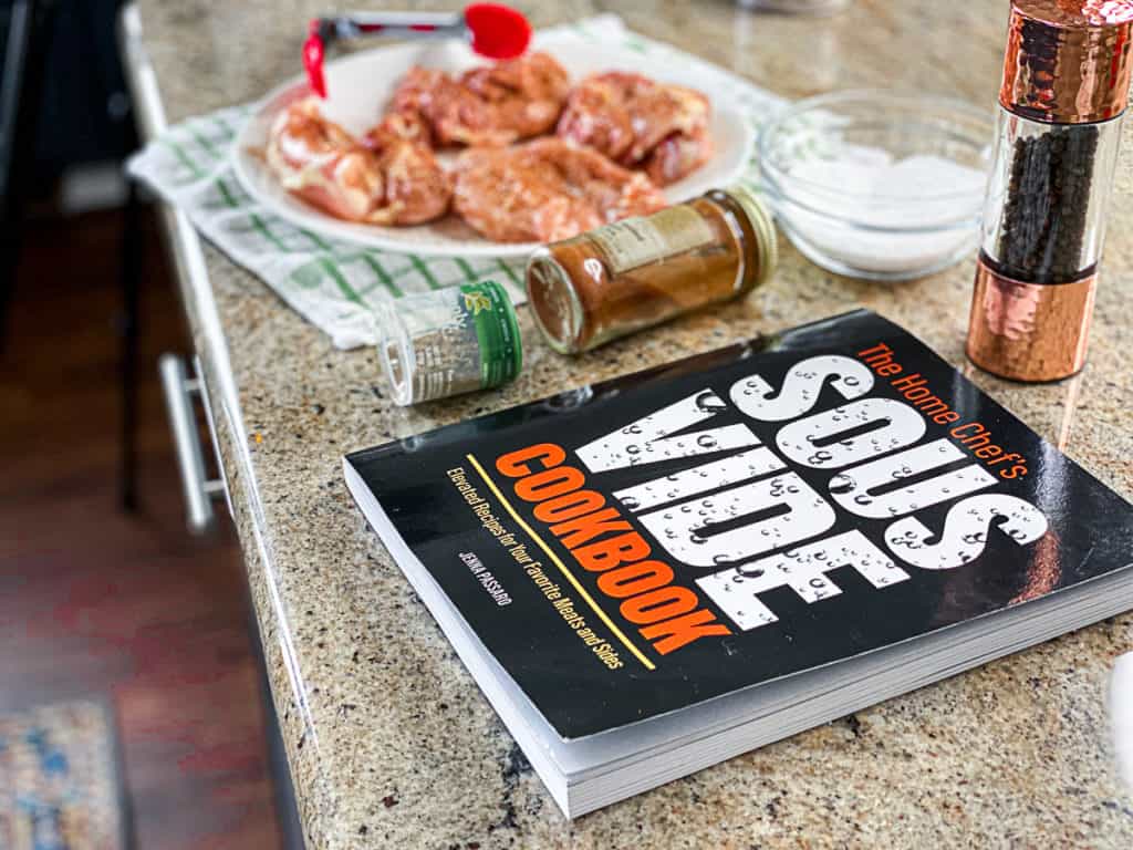 the home chef's sous vide cookbook and ingredients to make sous vide chicken thighs