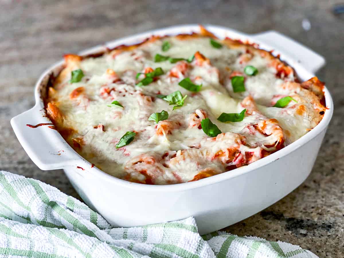 Side shot of cooked baked rigatoni pasta side dish.