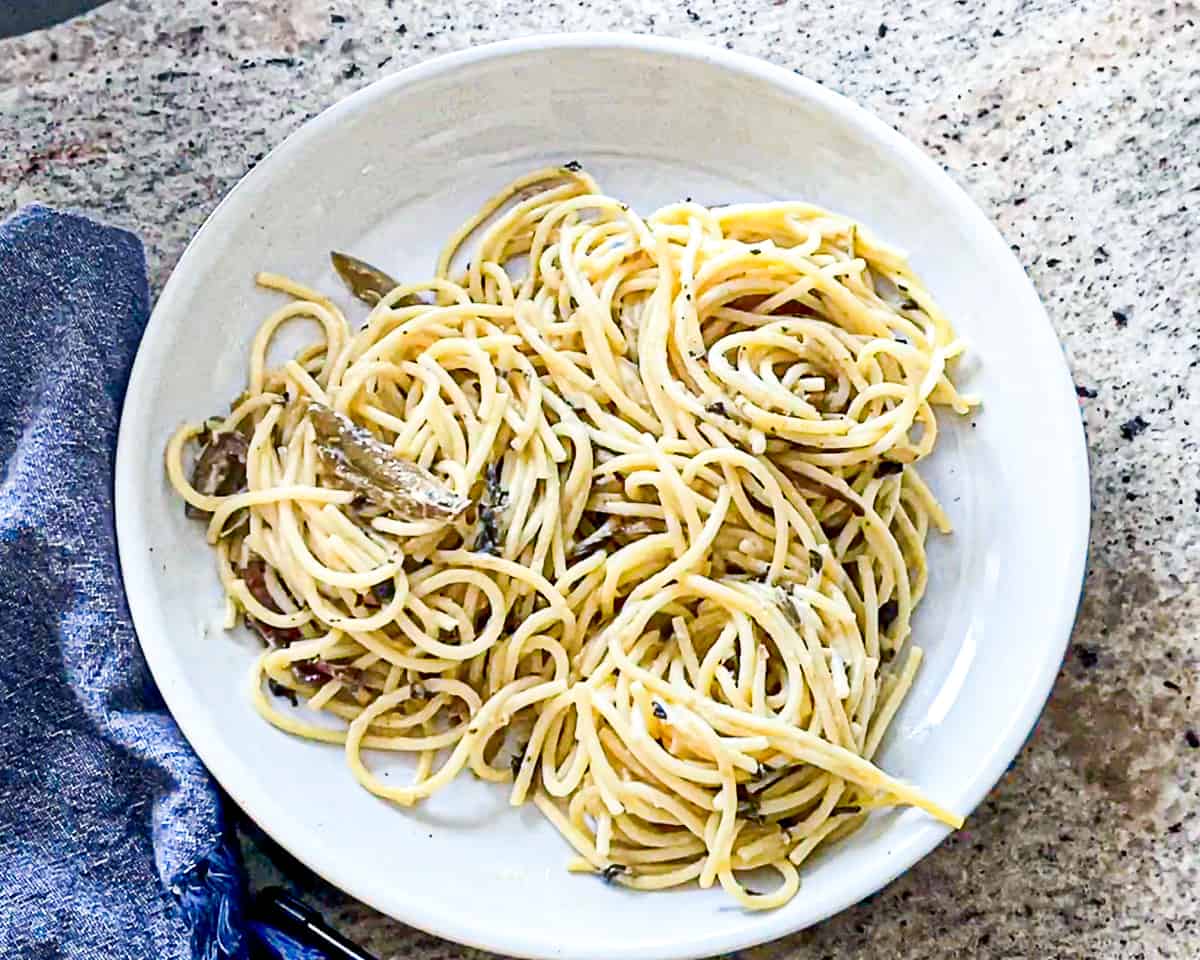 Top down shot of alfredo pasta dish.