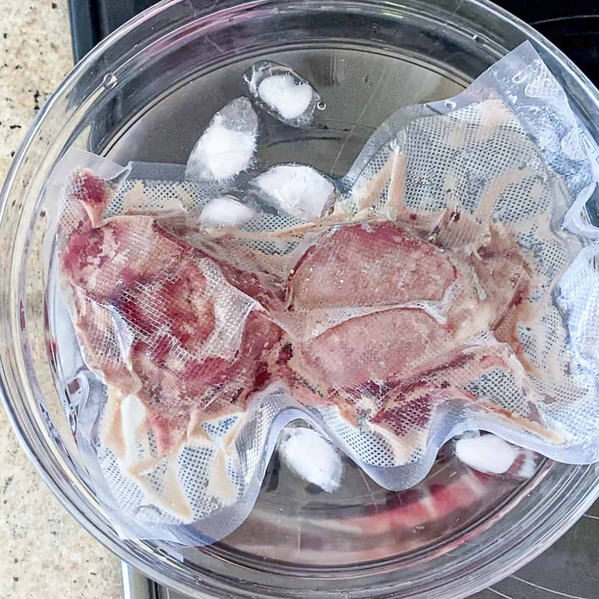 Filet mignon steak in ice bath.