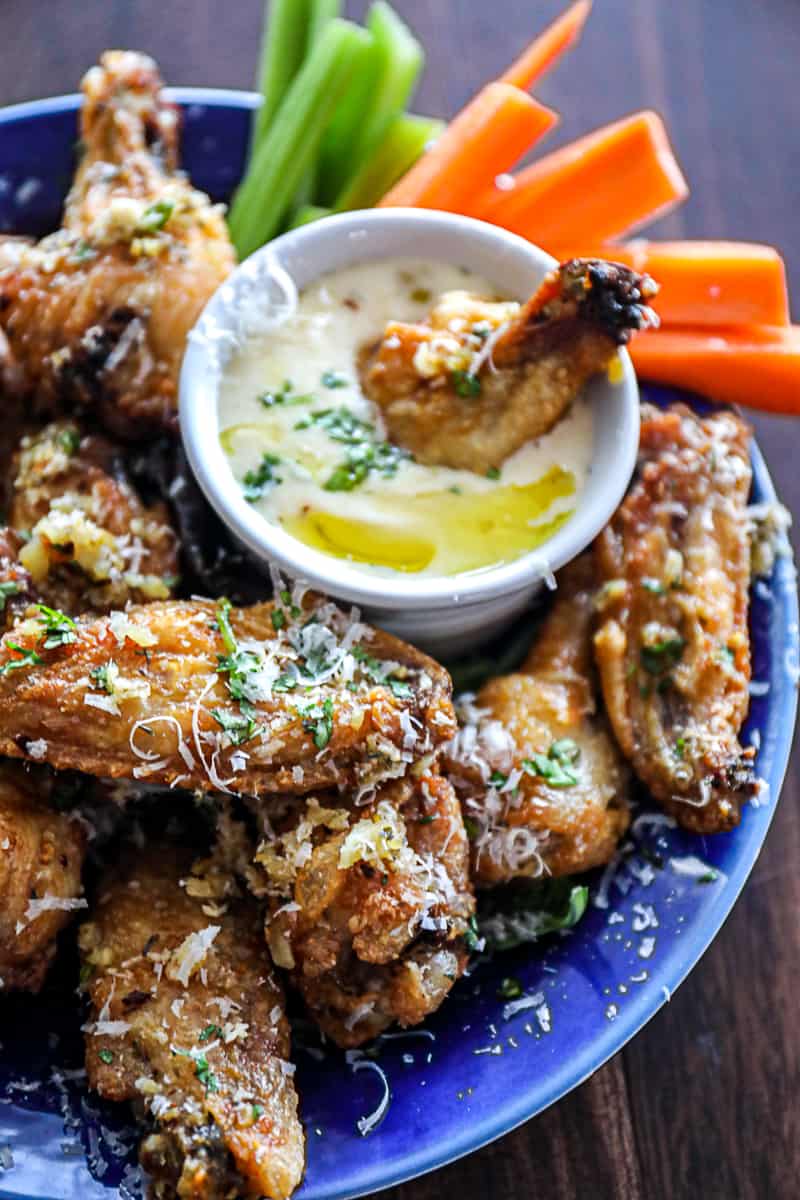 Air Fryer Baked Garlic Parmesan Chicken Wings with cheese sauce dip.